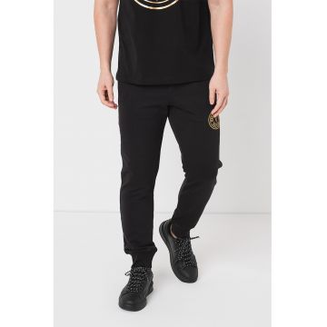 Pantaloni de trening cu buzunare oblice