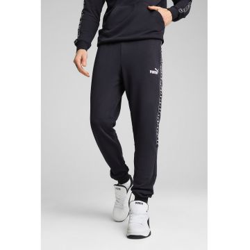 Pantaloni de trening cu croiala conica si buzunare laterale