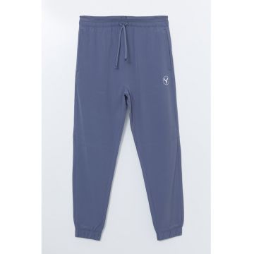 Pantaloni de trening cu model uni si talie elastica
