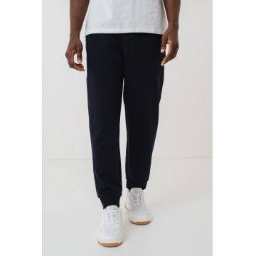 Pantaloni conici de trening