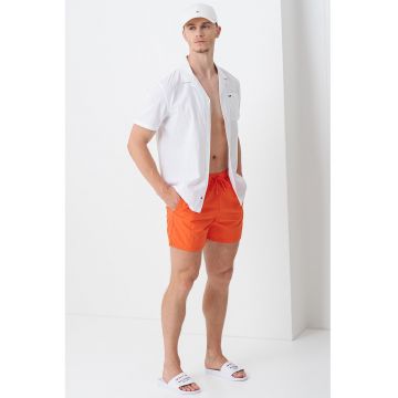 Pantaloni sucrti de baie cu snururi si model uni