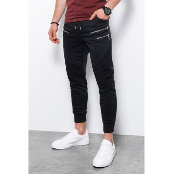 Pantaloni conici de trening cu buzunare cu fermoar