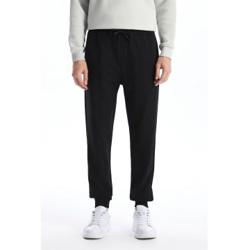 Pantaloni de trening uni cu terminatii elastice