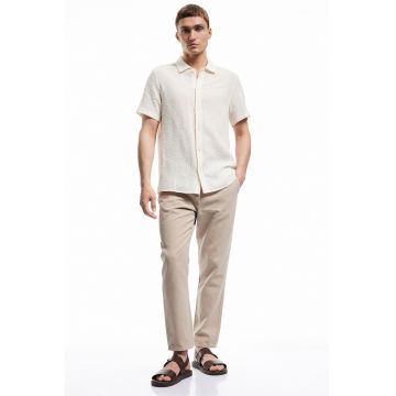 Pantaloni conici de bumbac cu buzunare laterale