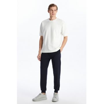 Pantaloni de trening uni cu terminatii elastice