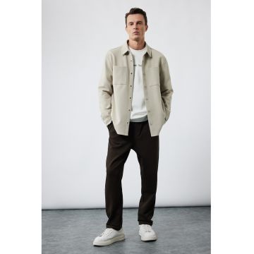 Pantaloni conici cu talie elastica