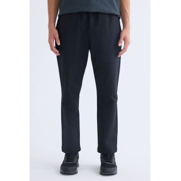Pantaloni conici de trening