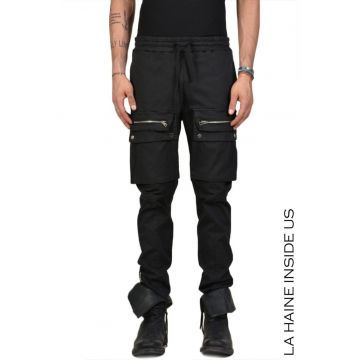 Pantaloni slim cu buzunare supradimensionati aplicate
