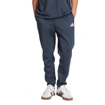 Pantaloni de trening conici cu buzunare laterale