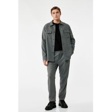 Pantaloni conici cu model uni Pantaloni conici cu model uni