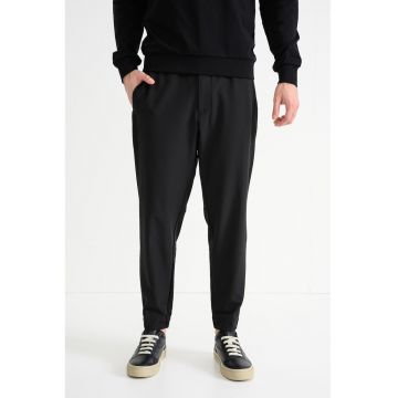 Pantaloni de trening cu croiala conica Flex - Negru