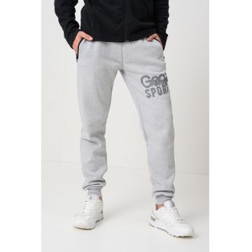 Pantaloni de trening cu buzunare cu fermoar Mister - Gri deschis melange