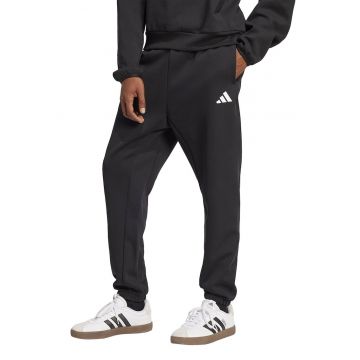 Pantaloni de trening conici cu buzunare laterale - Negru