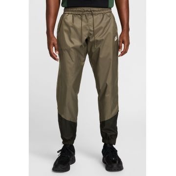 Pantaloni cu slituri cu fermoar la glezna Windrunner - Negru/Verde masliniu