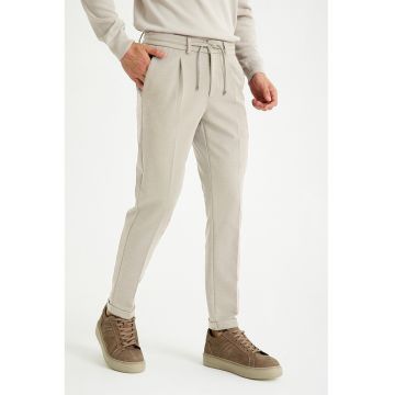 Pantaloni jogger cu croiala conica - Bej