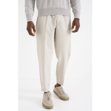 Pantaloni de trening cu croiala conica Flex - Bej deschis