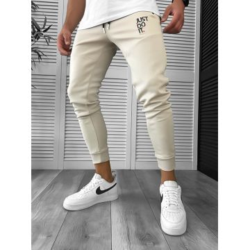 Pantaloni de trening bej cu mic defect DEF12616
