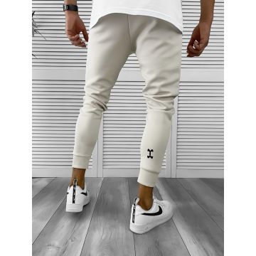 Pantaloni de trening bej  silon  conici CU MIC DEFECT DEF12379  O2-3.2