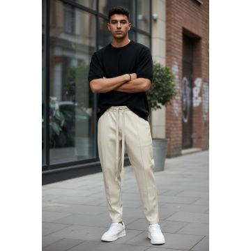 Pantaloni de trening bej conici 2648