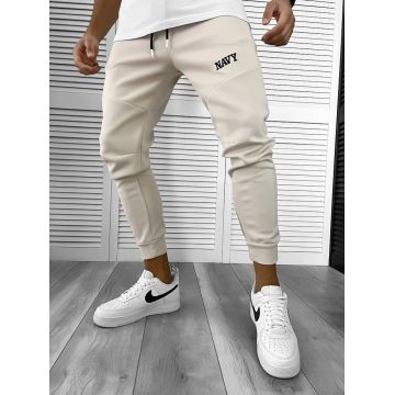 Pantaloni de trening bej  silon  conici cu mic defect DEF12376 P19-4.3