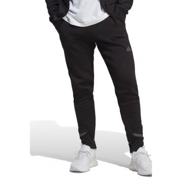 Pantaloni sport slim fit cu buzunae oblice - Negru