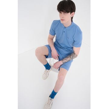 Tricou polo slim fit cu logo grafic - Albastru deschis