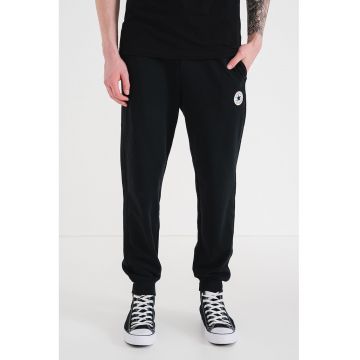 Pantaloni de trening cu croiala conica si aplicatie logo - Negru