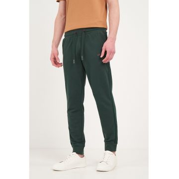 Pantaloni de trening cu buzunare cu fermoar - Verde padure