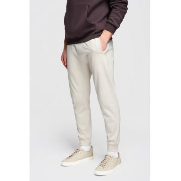 Pantaloni de trening din bumbac cu snururi de ajustare - Crem