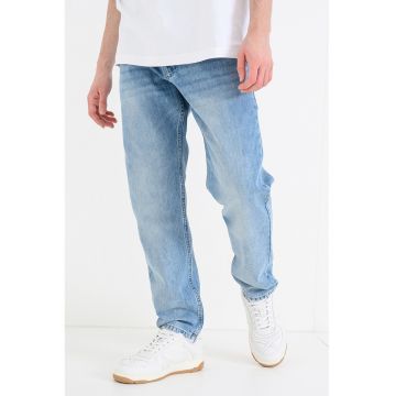 Blugi cu croiala conica si aspect decolorat - Albastru deschis