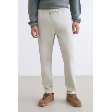 Pantaloni de trening cu snururi si model uni - Crem