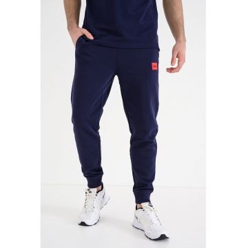 Pantaloni de trening cu buzunare oblice Doak - Albastru indigo