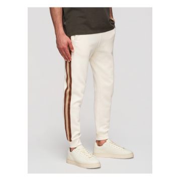 Pantaloni jogger cu elastic si buzunare laterale din material moale - Crem