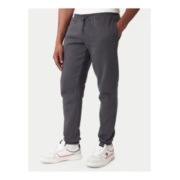 Pantaloni de trening cu model uni si buzunare laterale