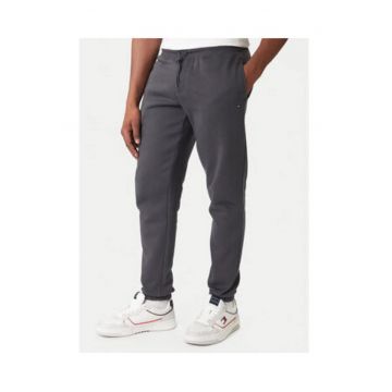 Pantaloni de trening cu model uni si buzunare laterale