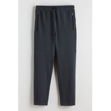Pantaloni de trening cu snur de ajustare si buzunare cu fermoar - Gri carbune