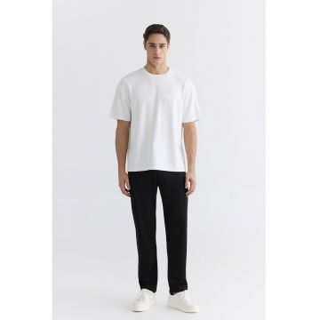 Pantaloni slim fit de trening cu snur si buzunare cu fermoar - Negru