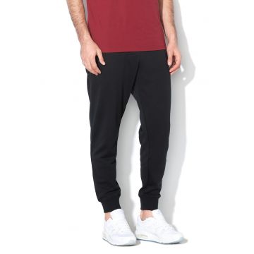 Pantaloni de trening conici cu buzunare laterale Sportswear Club - Negru