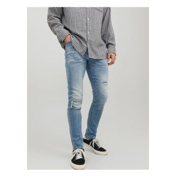 Blugi skinny cu rupturi decorative