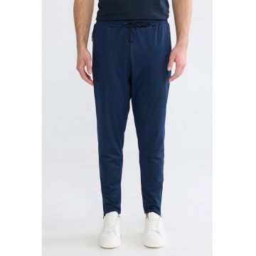 Pantaloni de trening cu slit cu fermoar la terminatii - Bleumarin
