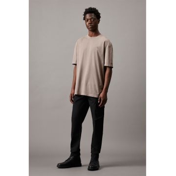 Pantaloni cu croiala conica si buzunare - Negru