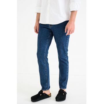 Blugi slim fit cu buzunare aplicate pe partea din spate - Albastru
