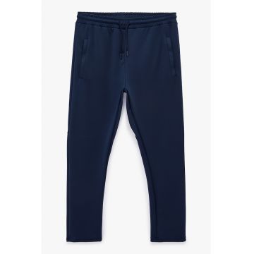 Pantaloni de trening cu snur si buzunare oblice - Bleumarin