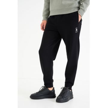 Pantaloni de trening lejeri cu buzunare laterale - Negru