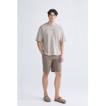 Pantaloni scurti din bumbac cu buzunare oblice frontale - Maro deschis