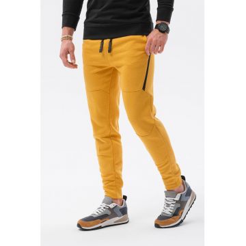 Pantaloni sport cu detalii contrastante