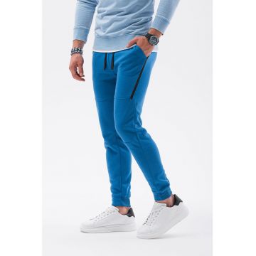 Pantaloni sport cu detalii contrastante