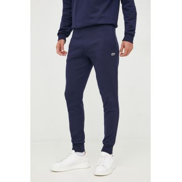 Lacoste pantaloni de trening barbati, culoarea albastru marin, neted